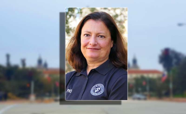 A woman smiling at camera