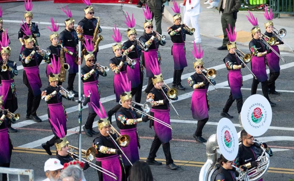 a band marching on street