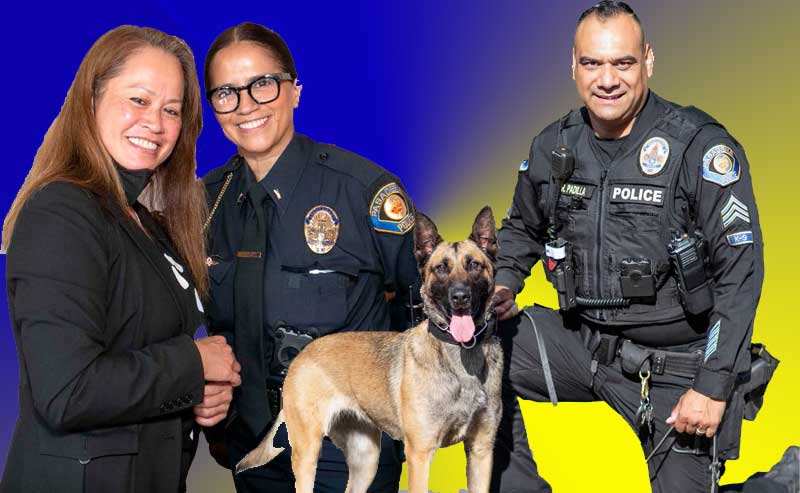 a woman and an officer next to an officer and his dog