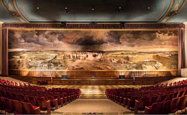 a hall with a huge mural