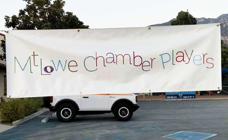 A banner in a parking lot