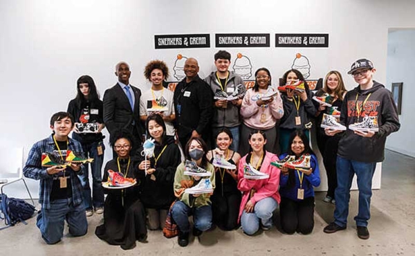 a group of students and educators posing for a photo