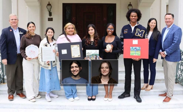 students with officials smiling