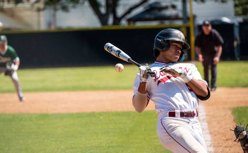 A player is hot by a ball