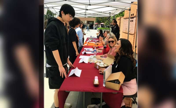 a student checking out a job offering