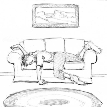 A guy dosing off on a sofa