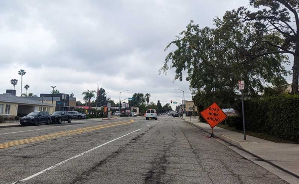 A road sign warning of construction