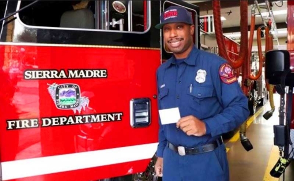 a firefighter smiling