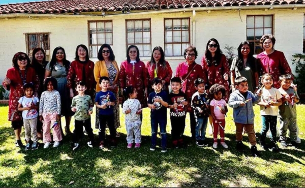 group of women gather for a photo op