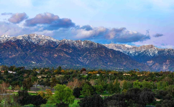 majestic mountains with clouds and snow