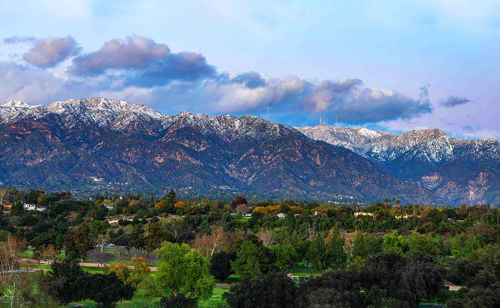 majestic mountains with clouds and snow