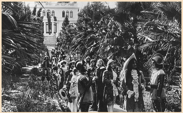 A group of actors in costumes from a movie scene