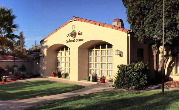 A building with green lawn