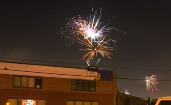 fireworks by a building