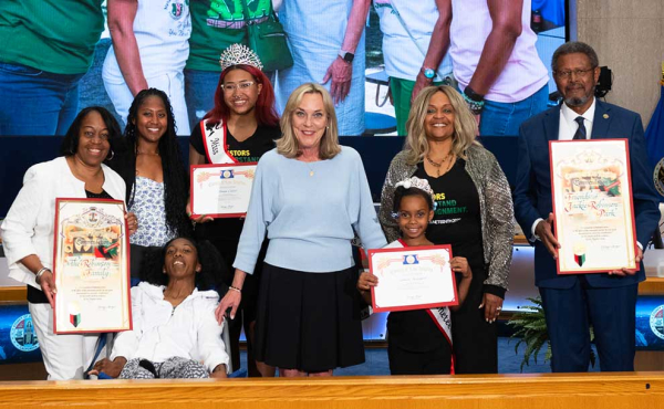 a group of people smiling at camera