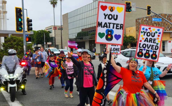 people holding pride signs