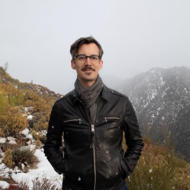 a man standing in the wilderness