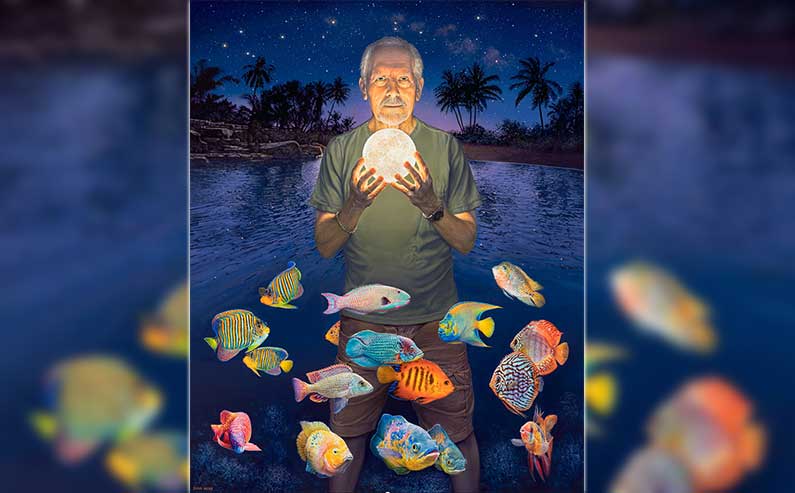 A man holding a lighted globe and fish underneath him