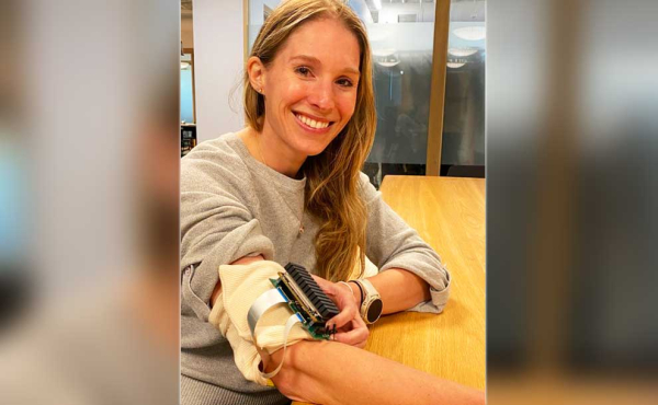 a woman with a blood pressure device on her hand