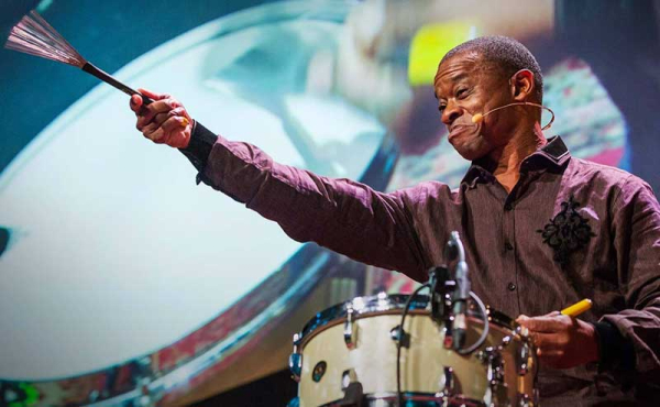 A man on a drummer set