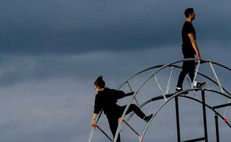 a man and a woman on a wheel