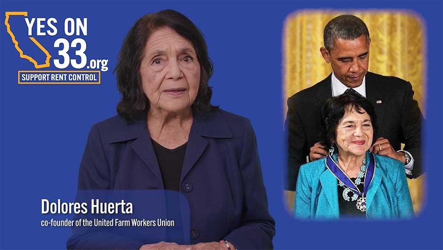 a woman speaking in favor of a proposition