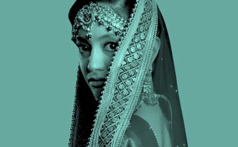 a woman wearing a head scarf