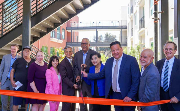 dignitaries cutting a ribbon