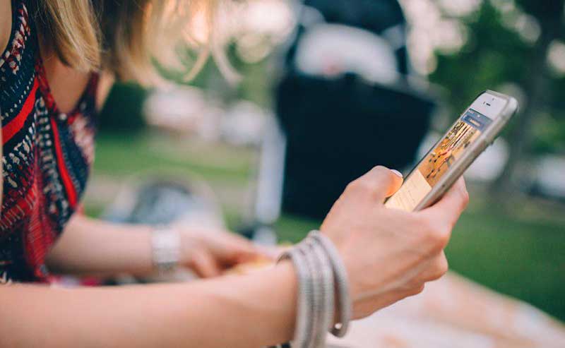 a hand holding a cellphone