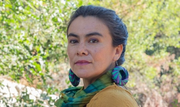 A woman looking at the camera