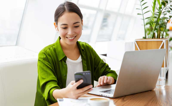 A woman holding a phone