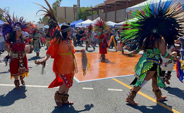dancers dressed in festive clothing