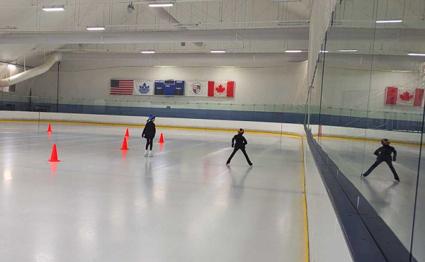 two girls ice skating