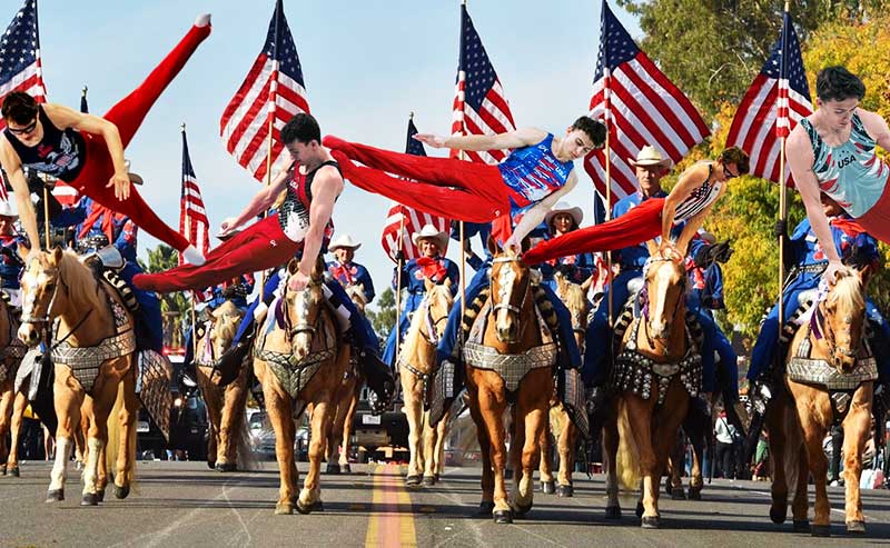 guys on horses doing acrobatic moves