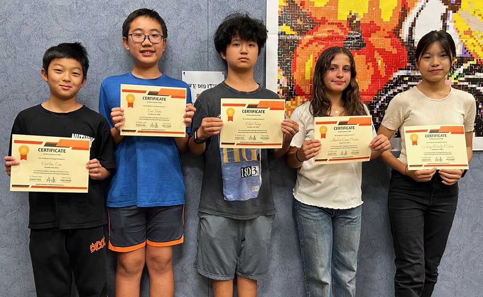 students holding certificates