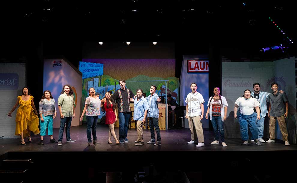 cast of a play on stage