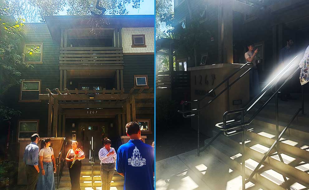 people checking out an affordable housing building