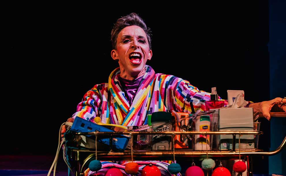 A man hamming it on stage