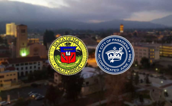 two seals over an overview of a city