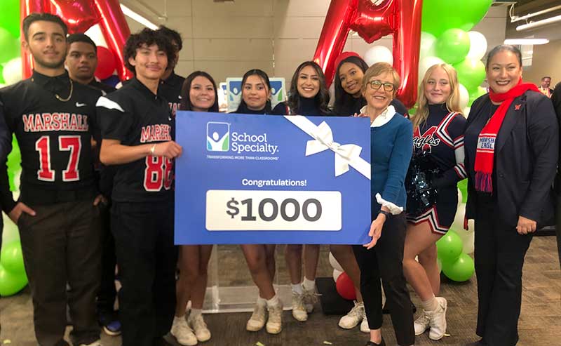 people holding a sign