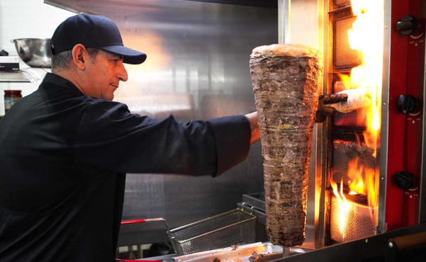 a chef making a sandwich