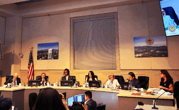 people sitting at the dais