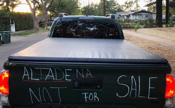 a truck with written words by hand