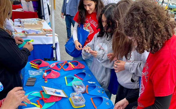 kids at a table browsing