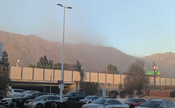 mountain top covered with debris and soot