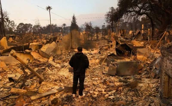 standing in the rubble