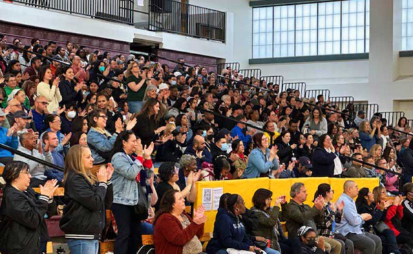 a group of people at a gymnasium