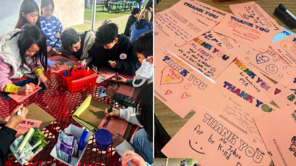 students writing notes