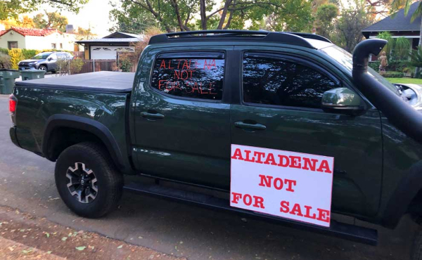 truck with "Altadena Not fr Sale" sign on it