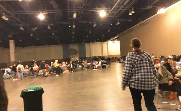 a large room with evacuees inside